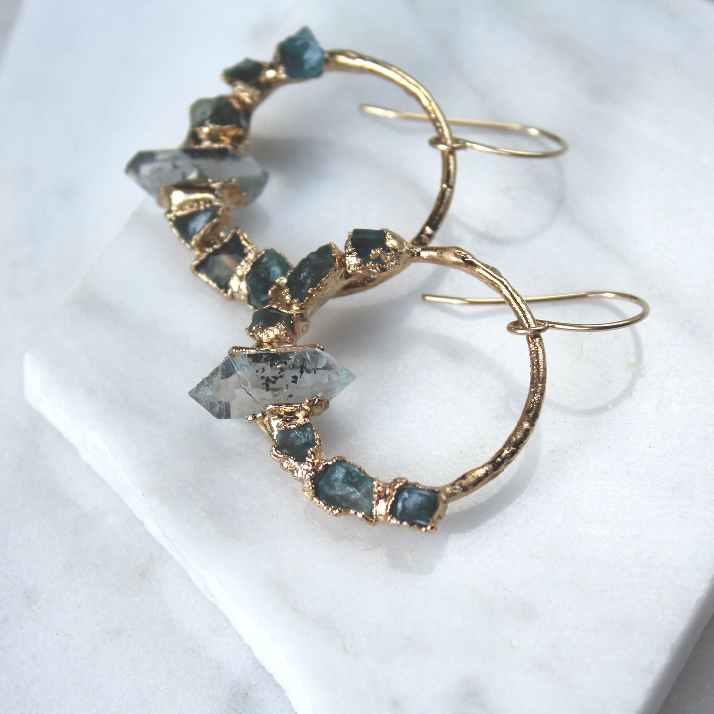Ula Herkimer diamond and Oregon Sunstone earrings